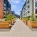 walkway flanked by large planter boxes