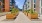 walkway flanked by large planter boxes
